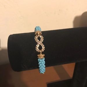 Blue and gold infinity bracelet